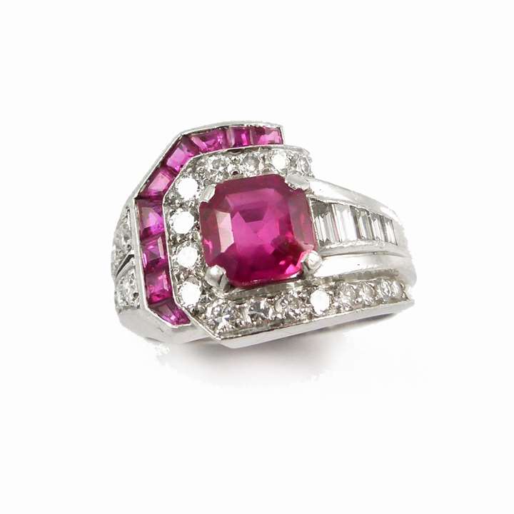 Ruby and diamond geometric cluster ring centred by an octagonal cut Burma ruby,